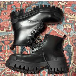 NWT Balenciaga Strike Bootie in Black size  US 9   Size: 9 Balenciaga  Leather upper with lug rubber sole  Made in Italy  Approx 50mm/ 2 inch heel 