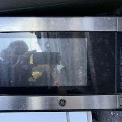 Stainless steel GE microwave oven