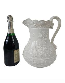 Large White Ceramic Pitcher with Relief Figures