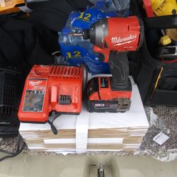 Milwaukee Fuel M18 Impact Drill n Charger