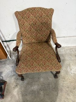 Traditional Upholstered Armchair with Carved Wood Accents