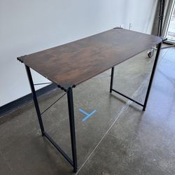 Simple and stylish wood surface desk / side table in great condition.