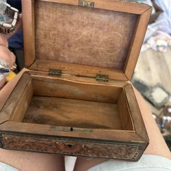 vintage, hand-carved wooden jewelry box, likely of Indian origin, possibly from the 1970s 