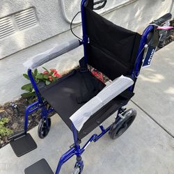 Transfer chair – recovery from surgery injury. Wheelchair with footrest,  handle brakes. Brand New.