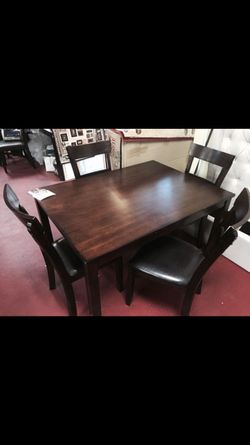 Brand new table with 4 chairs