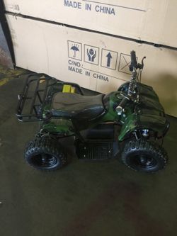Electric ATV with forward and reverse