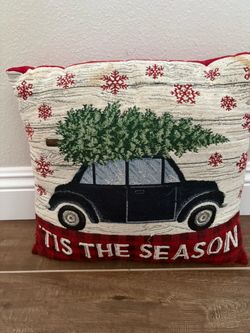 festive holiday tapestry throw pillow featuring a vintage car carrying a Christmas tree