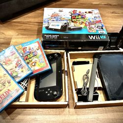 Nintendo WiiU Deluxe Console With 3 Videogames Zelda WindWaker, Super Mario 3D Worlds, And Mario Party 10