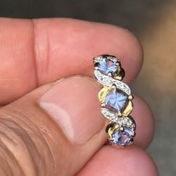Sterling Silver Ring With Natural Tanzanite Gemstones And Some Gold Decorating 