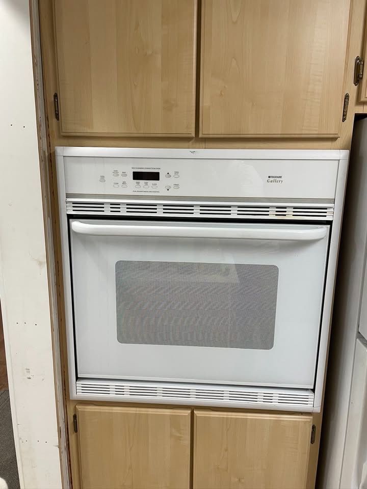 Frigidaire Oven and Koehler Stainless Steel Double Sink