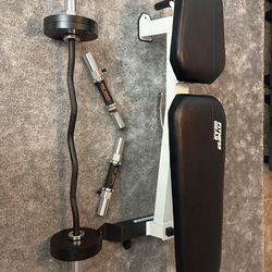Weight bench with ez curl bar and adjustable dumbbells