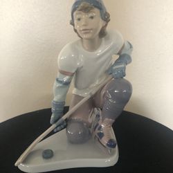 Lladro figurine, “hockey player”