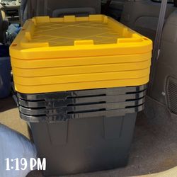 27 gollons black storage bins $8 each yellow lids
