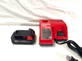 Brand new Milwaukee 2Ah battery and brand new charger