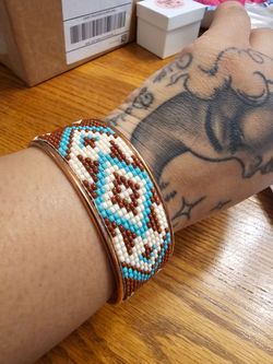 hand beaded copper cuffs