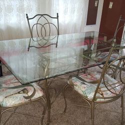 Glass dinning table 4 chairs
