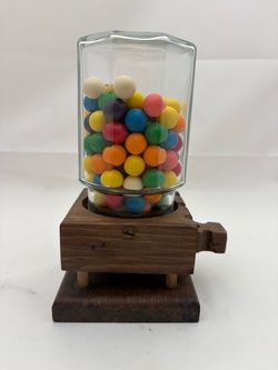 Vintage wooden gum ball machine