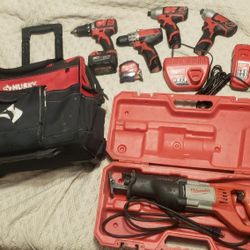 Milwaukee Tool Lot With Rapid Charger And, M12 Chargers. With Husky Rolling Tool Bag. Firm Price 