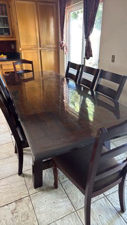 8 chairs and table plus sectional couch