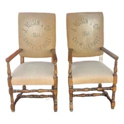 Pair of French high back upholstered armchairs