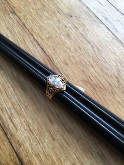 Gold plate ring with marquis cut cz