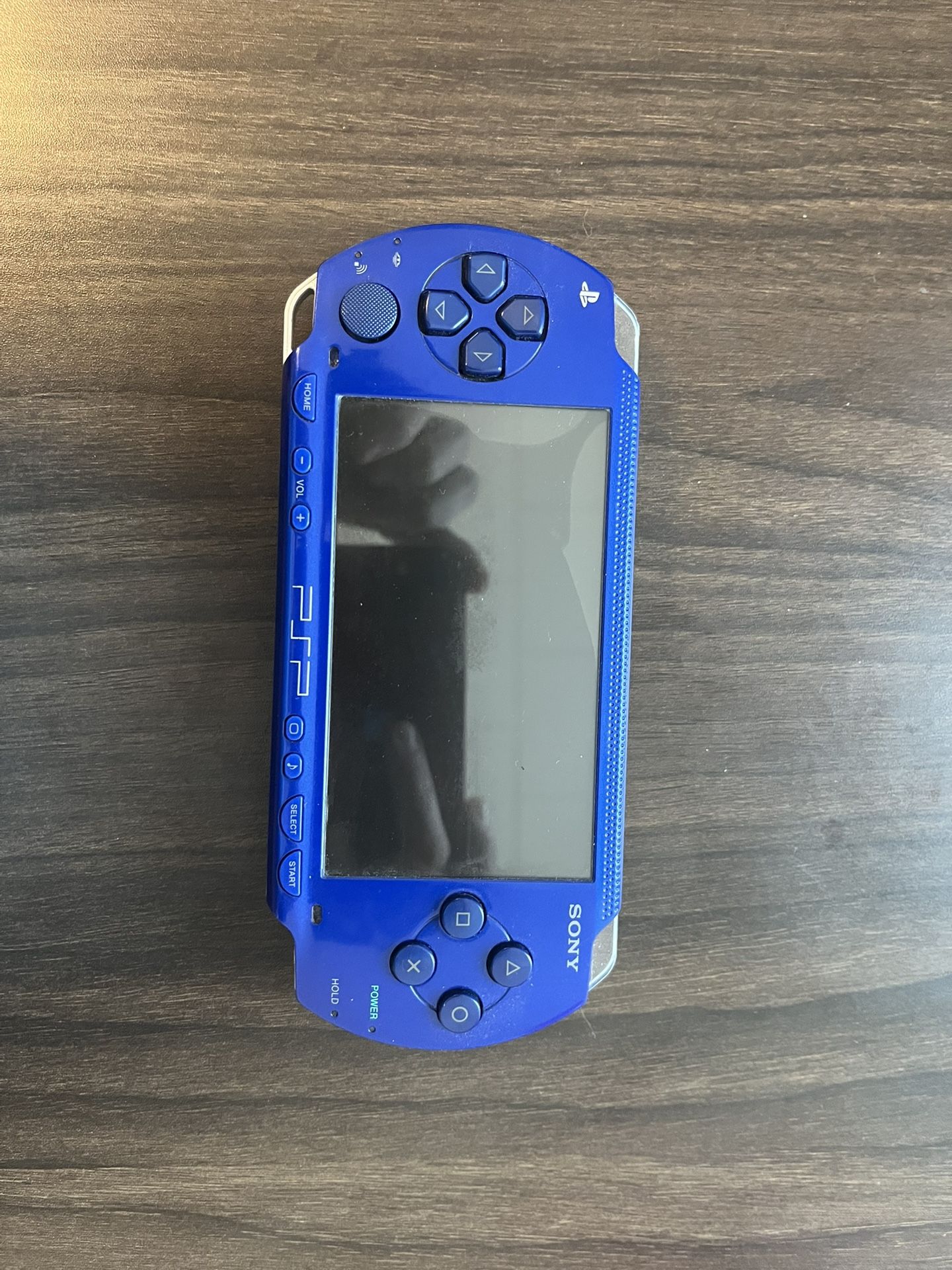 PSP 1000 (blue) with over 500 games from nes,snes,sega,ps1,psp $150 or best offer open to trades