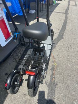 Scotter with seat