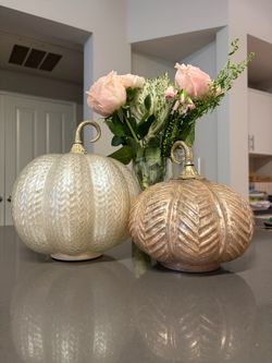 2 light up pink glass pumpkins