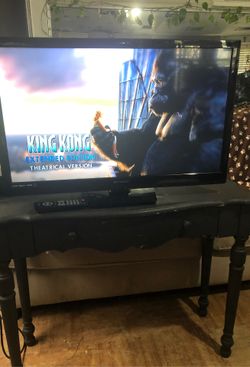 Tv de 32 pulgadas con su control