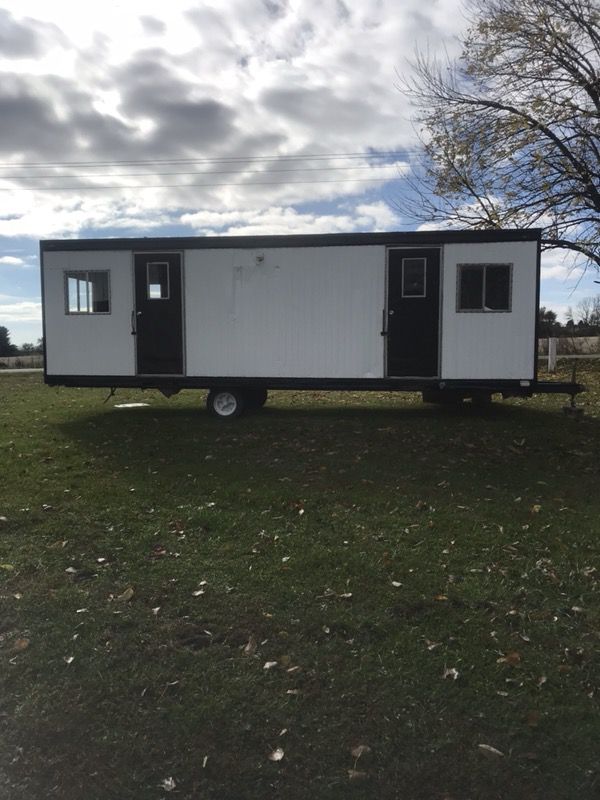 25’ Constrution/ Office Trailer fresh coat of paint on outside new carpet new roof no leaks no mold good Tires 110 220 panel good flooring electric h