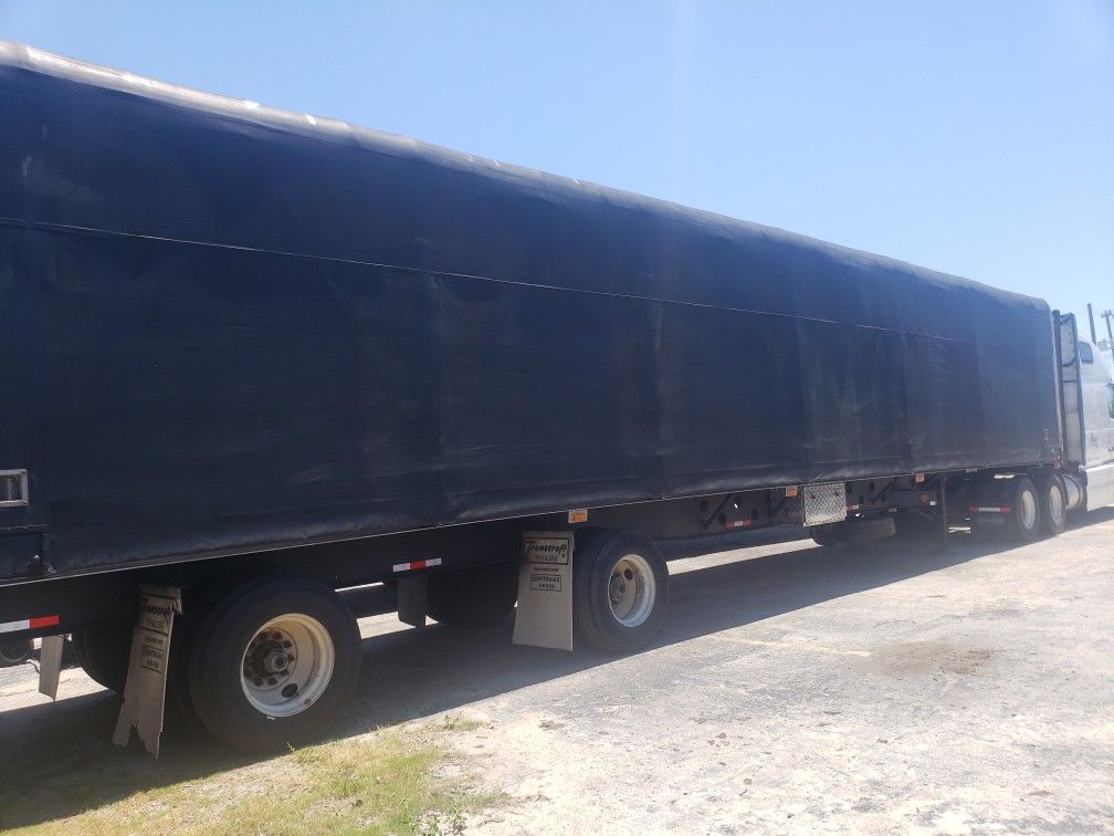 Flatbed conestoga trailer