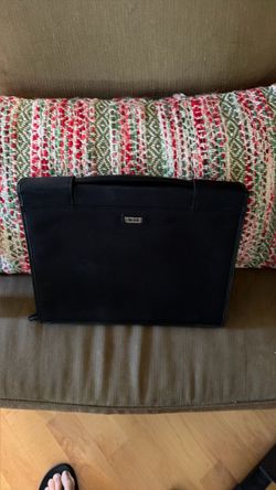 Tumi zip up briefcase