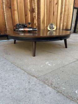 Mid-century modern style wood around low profile coffee table