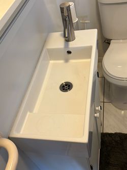Ceramic and vanity combination with side faucet