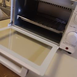 Tostadora SEMINUEVA.Marca WALMART