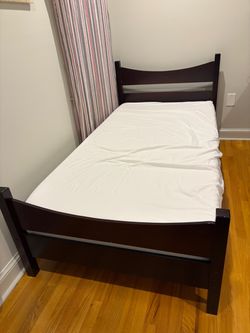 Twin size bed with mattress