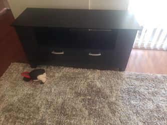 Tv Stand Black With Measurements Of Length 44" X Width Of 16" By 221/2 Height.