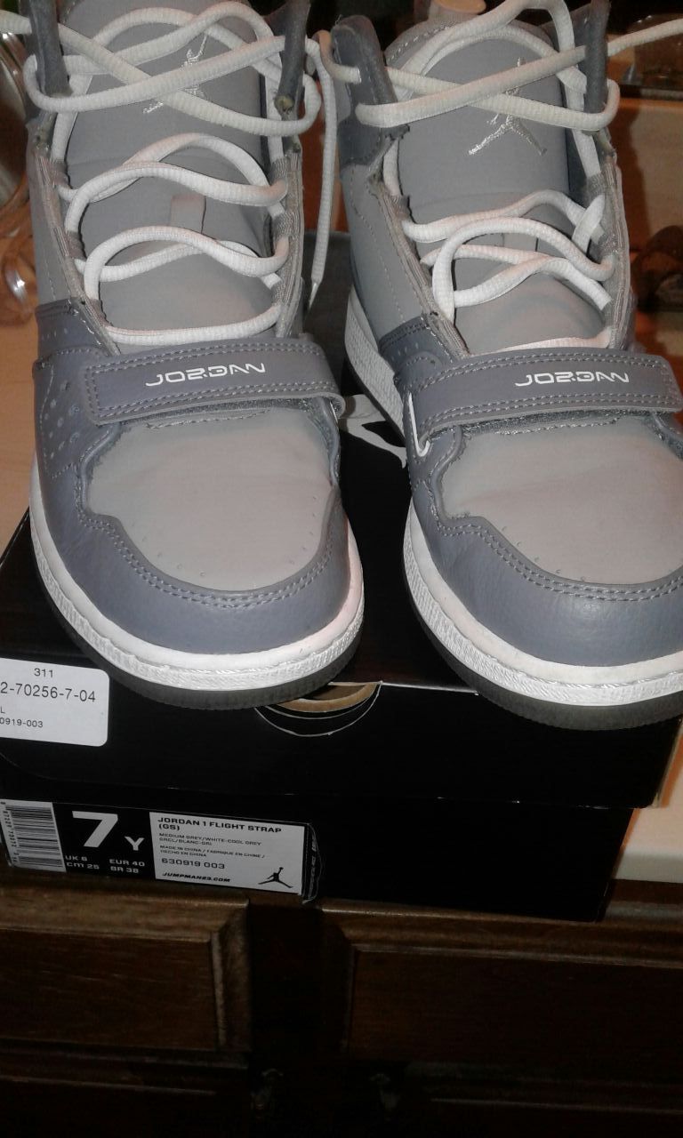 Jordan Flight Strap in Grey color and they are size