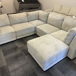 Grey Modular Fabric Sectional With Ottoman