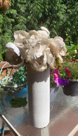 White vase with flowers