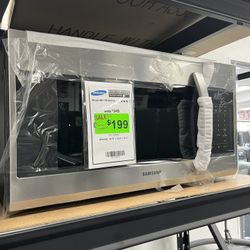 Microwave- Microwave Brand New 1 Year Warranty  Delivers And Installation Service 