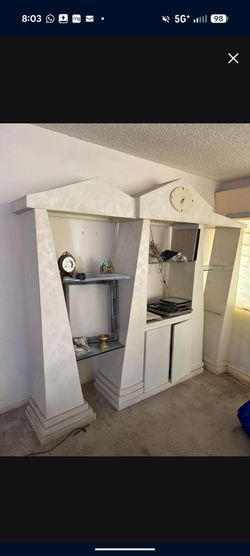 Wall unit with entertainment center & glass book shelves