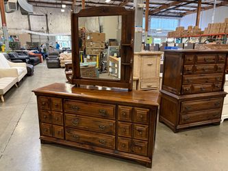PLYMOUTH PINE Vintage Wooden 9 Drawer Triple Dresser with Mirror and Paneled Drawer Fronts