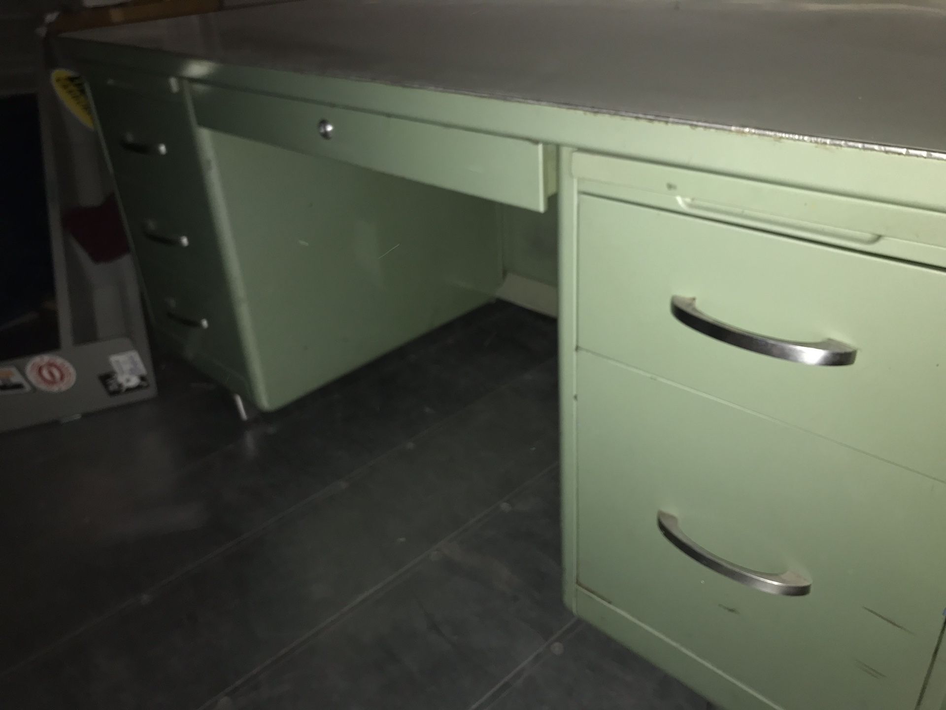 Ex Boeing steel desk with locking drawer very well. Built