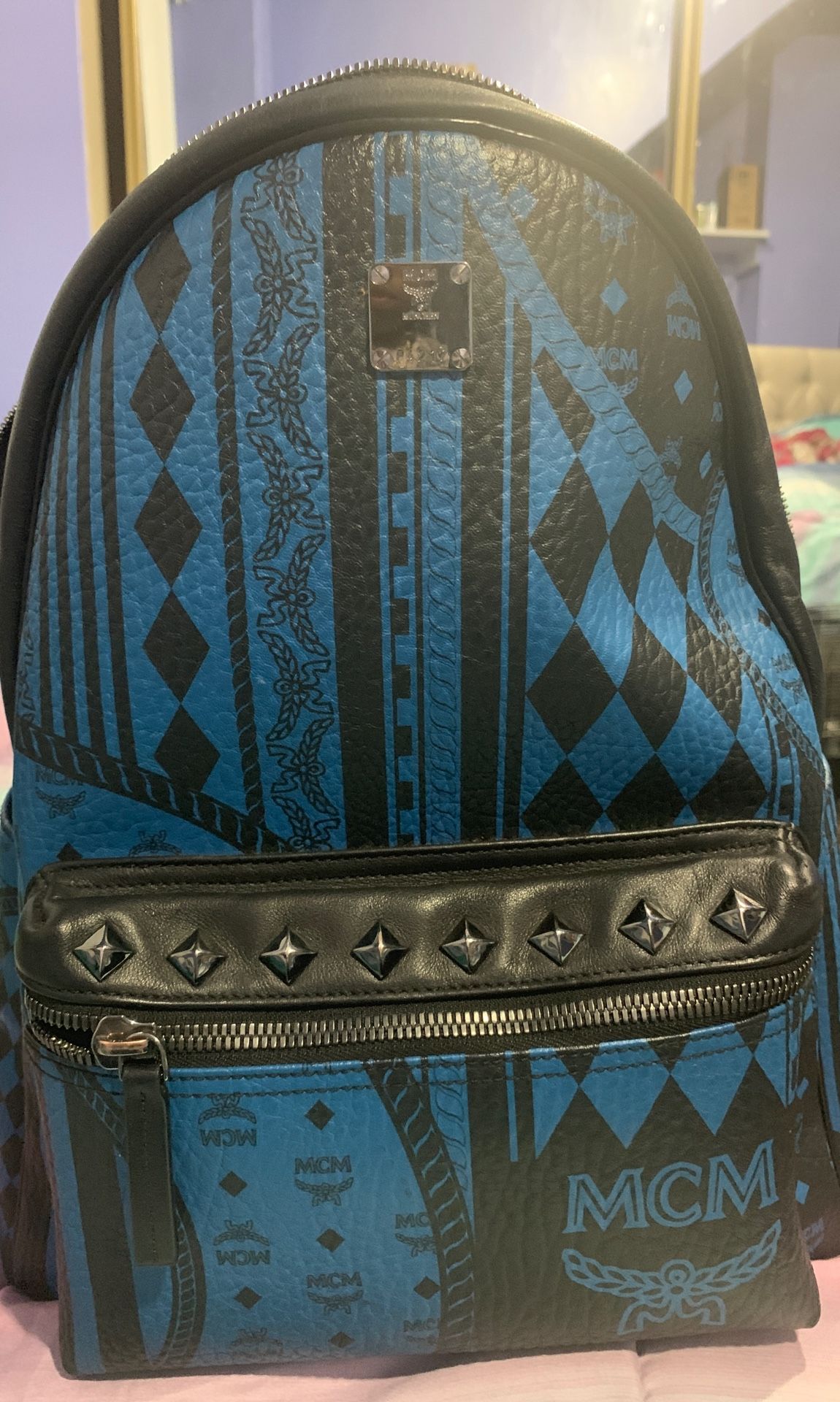 Brand new MCM black and blue studded backpack