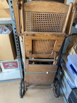 Old wooden wheelchair