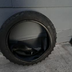 Tire for tuttio with tube