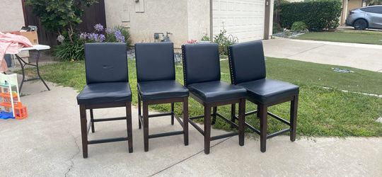 4 leather chairs