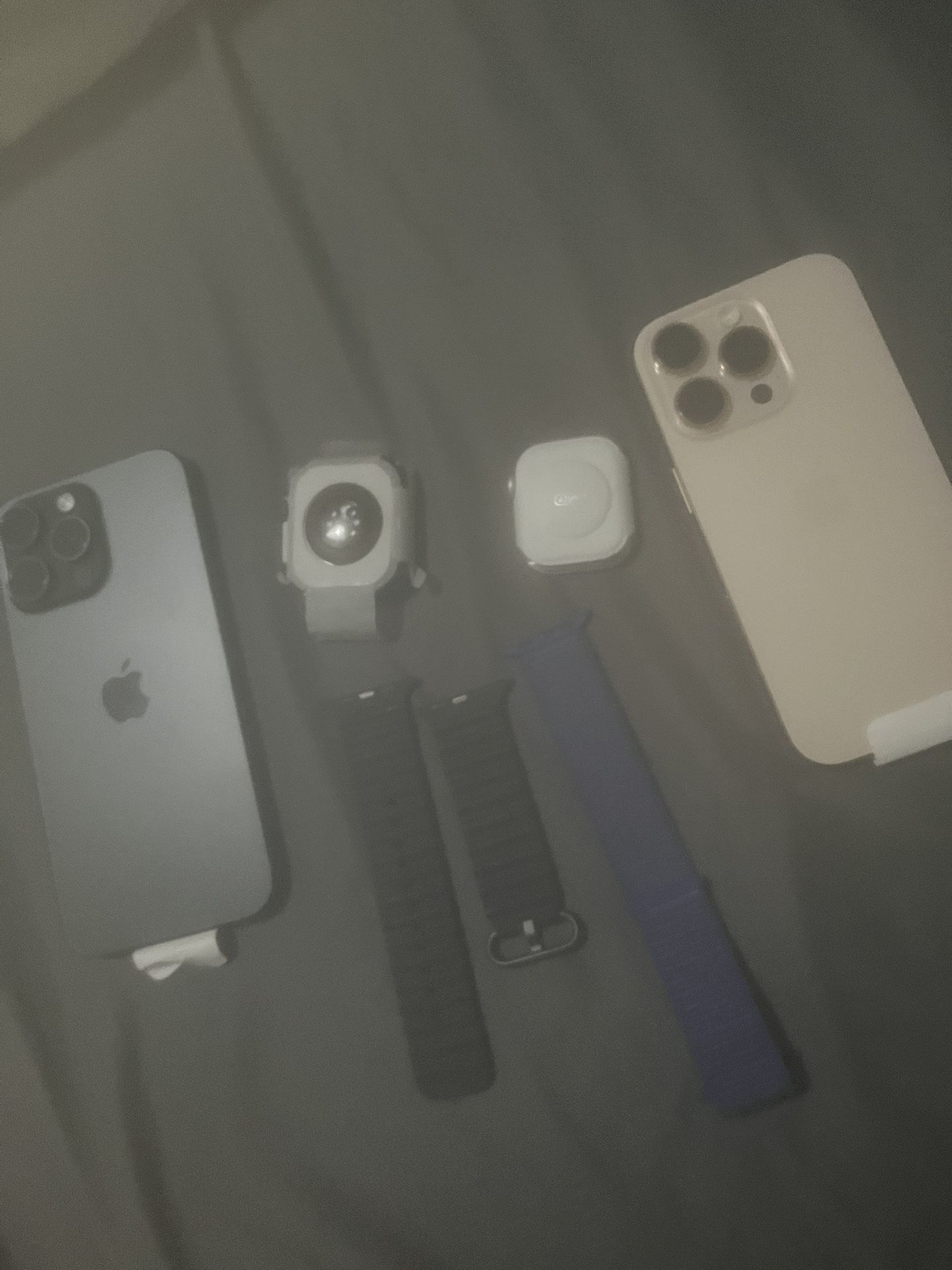 iPhone 16 Pro Max And iPhone 16 Pro With Two Watches 