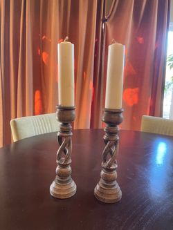 Rustic wood candlesticks with candles